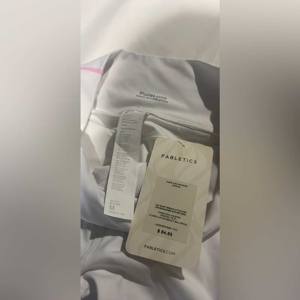 NWT Fabletics pureluxe white leggings with pink stripe.